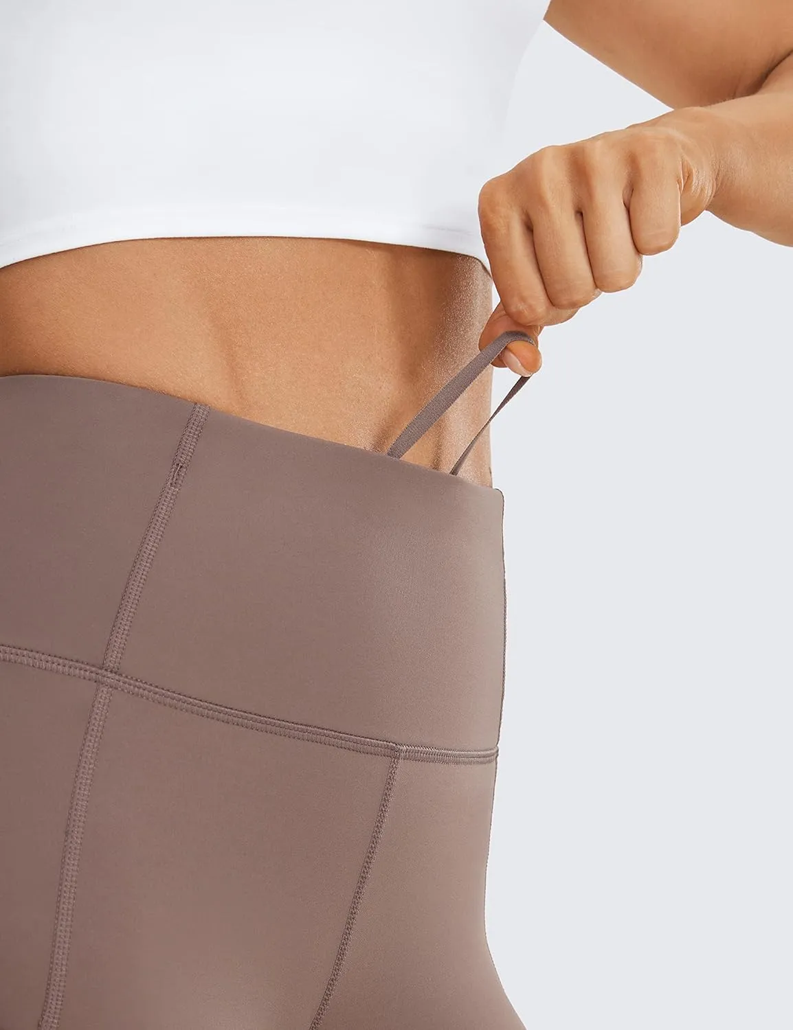 CRZ YOGA Womens Naked Feeling Light Biker Shorts with Pockets 8 Inches - High Waisted Workout Athletic Running Yoga Shorts